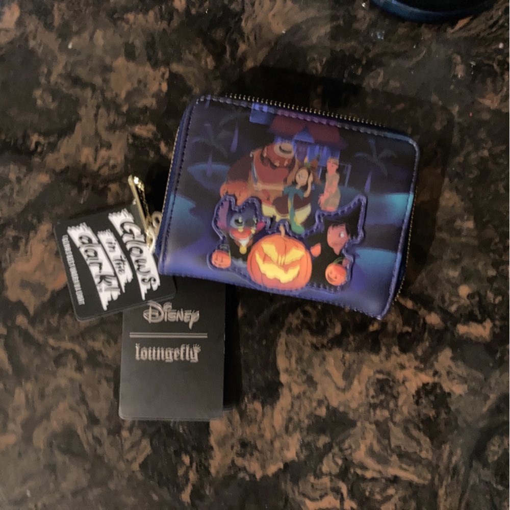 Brand new with Tags. Lilo & Stitch Glow in the dark wallet from Disney Loungefly